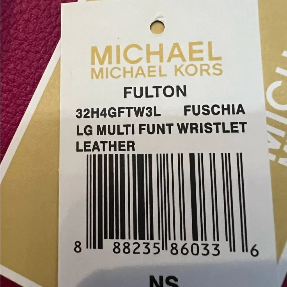 Michael Kors fuchsia multi function wristlet